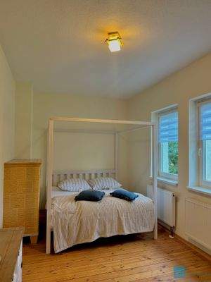 Schlafzimmer mit Doppelbett