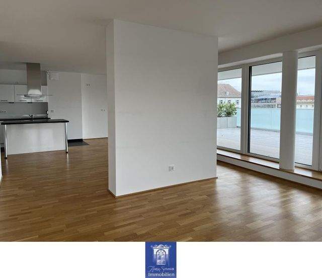 Stilvolle Wohnung mit viel Platz, zwei Bädern und umlaufender Terrasse! - Foto 2