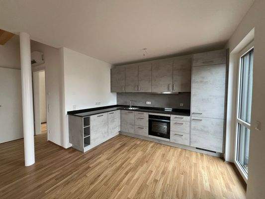 Wohnen/Küche einer fertiggestellten Wohnung