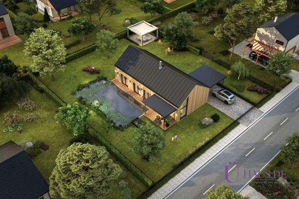 Bungalow 106 Außenansicht 5 mit Logo