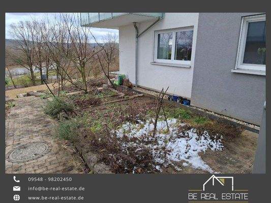 Wohnungsansicht von der Seite mit Gartenteil