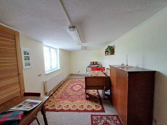 Anbau Wohnhaus - Aufenthaltsraum (ehem. Garage)