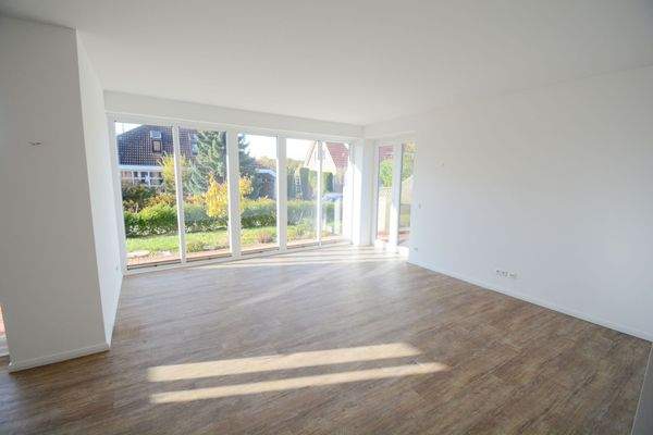 Wohn-/Esszimmer mit Terrassenzugang