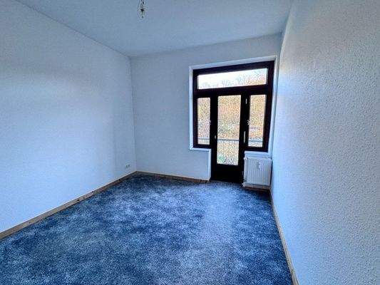 Wohnzimmer mit französischem Balkon