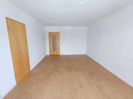 Wohnzimmer mit Holzboden