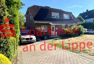Doppelhaushälfte links mit Garage
