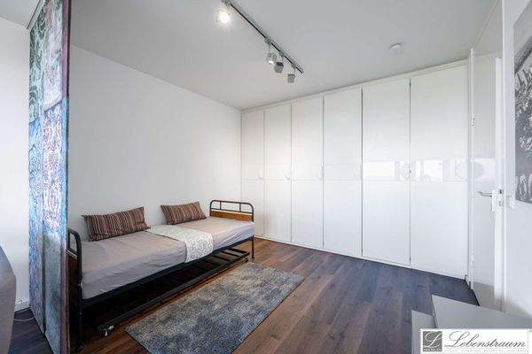 Schlafbereich mit Wandschrank