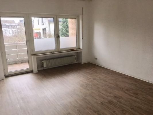 Wohnzimmer mit Balkon