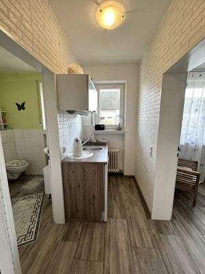 Kompakte Küche mit cleverer Raumaufteilung - Effizienz auf kleinstem Raum!