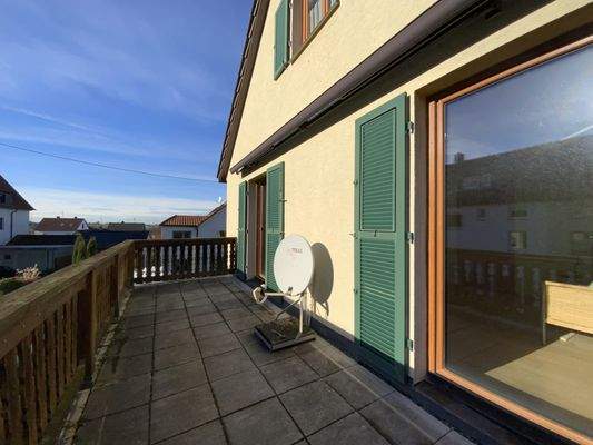 Balkon mit Obergeschoss