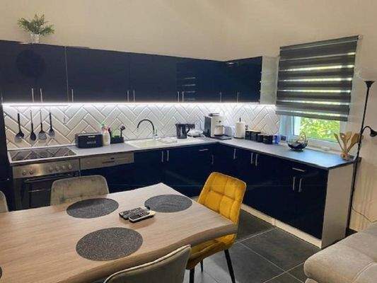 Wohnzimmer + Esszimmer + Küche