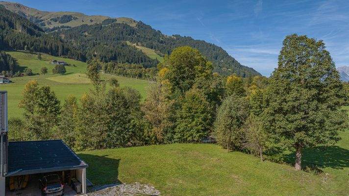 KITZIMMO-Baugrundstück mit Baugenehmigung in Aurach bei Kitzbühel.
