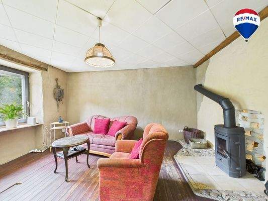 RE/MAX Immobilien DeLux Einfamilienhaus Mettlach-Dreisbach Wohnzimmer