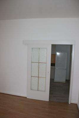 Blick vom Wohnzimmer zur Küche