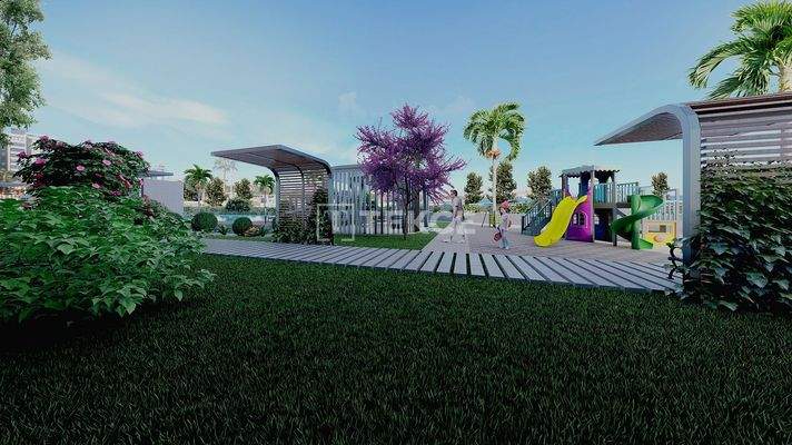 New Apartments in Mersin with a Pool and Modern Landscaping