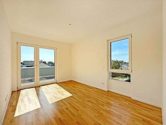 Schlafzimmer mit Zugang zur Dachterrasse