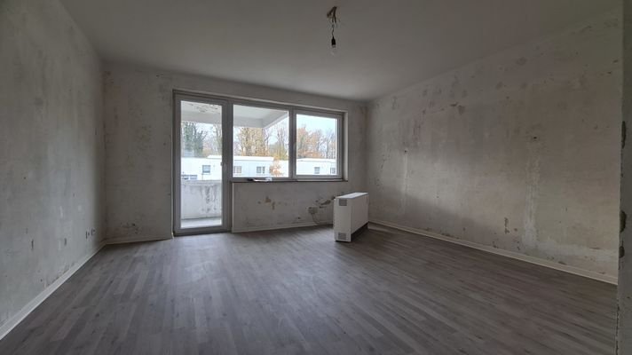 Wohnzimmer mit Balkon