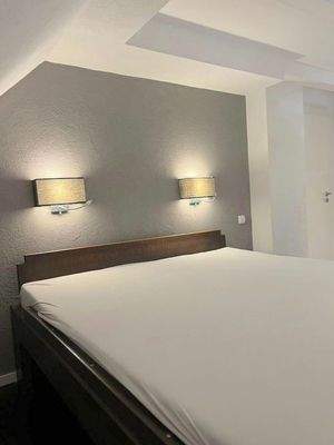 OG Designerleuchten am Bett