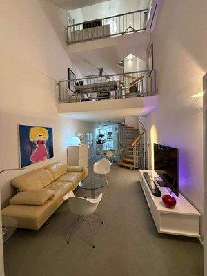 Wohnzimmer mit offener Galerie