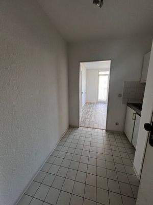 Blick in den Flurbereich mit Single Küche