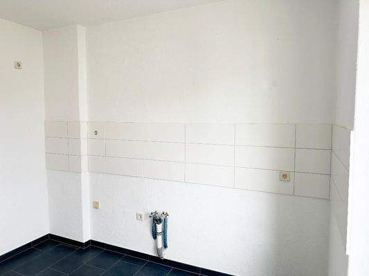 Küche mit Fliesenspiegel