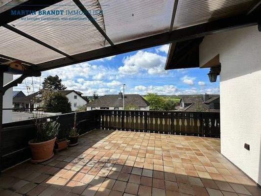 überdachte Süd-West Terrasse