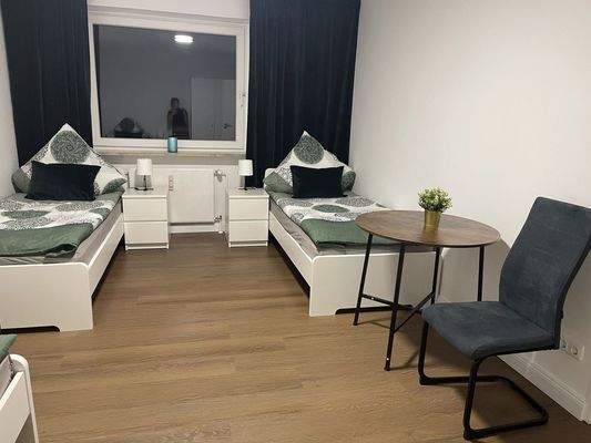 3-Bett-Zimmer mit Sitzecke