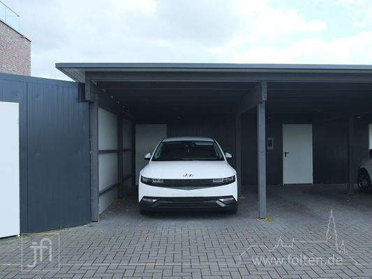 Carport-Stellplatz und Fahrradschuppen