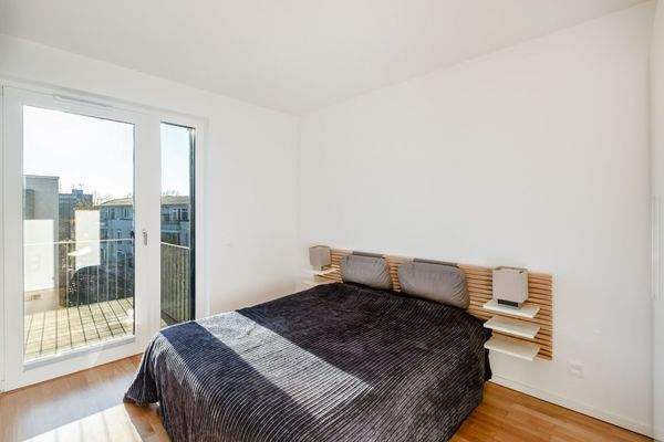 Schlafzimmer mit Balkonzugang