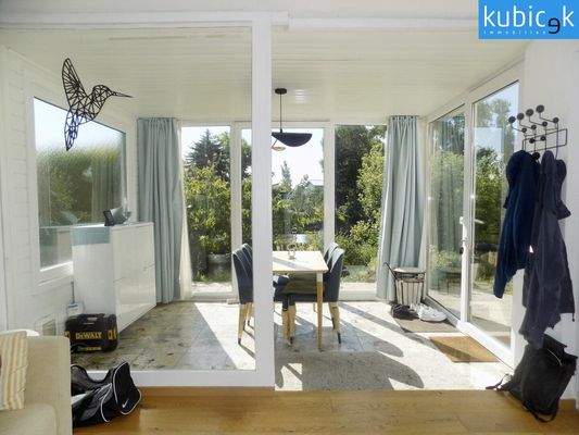 Wintergarten mit Blick zum See