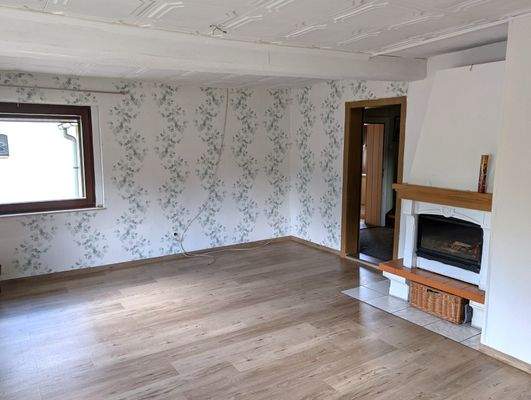 Wohnzimmer mit Kamin