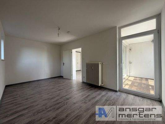 Schlafzimmer mit Balkonzugang