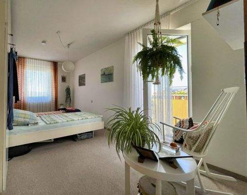 Schlafzimmer mit Balkon