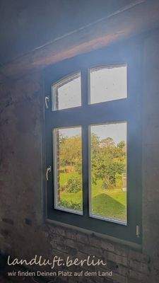 Neues Holz-Iso-Fenster oben im Nordgiebel.jpg