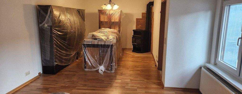 Zimmer mit Kaminofen