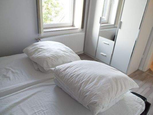 Eins der Schlafzimmer