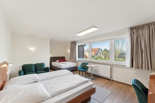 Dreibettzimmer