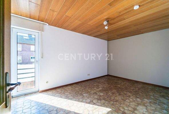 Schlafzimmer mit Balkonzugang