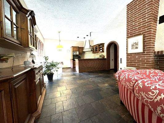 Wohnzimmer mit Blick zur offenen Küche Wohnung EG