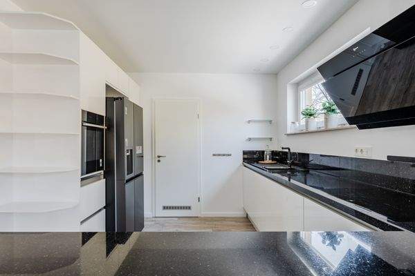 High-quality fitted kitchen with large pantry