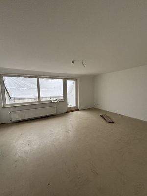 Wohnzummer mit Balkonzugang