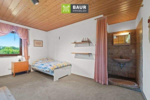 Schlafbereich im Wohnzimmer UG