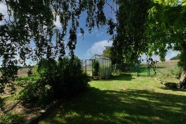 Gartenansicht - Gewächshaus