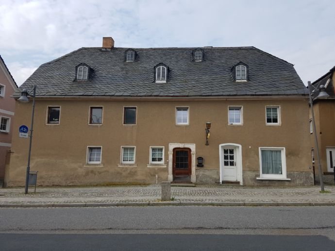 Mehrfamilienhaus mit Gewerbe im Herzen von Schirgiswalde