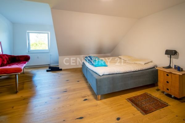 Schlafzimmer Drei-Zimmerwohnung DG