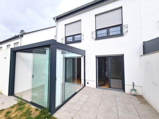 Terrasse mit Wintergarten