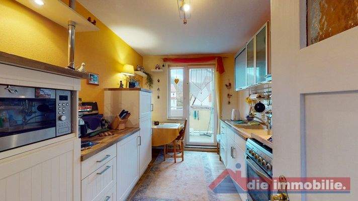 Küchenbereich im Dachgeschoss mit offenem Wohnkonzept