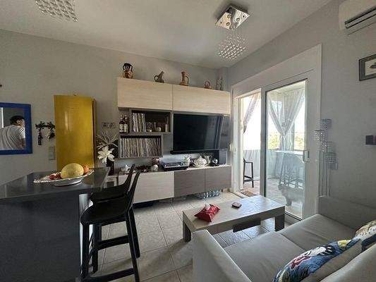 Kreta, Agia Triada: Charmantes Apartment mit Gemeinschaftspool und Meerblick zu verkaufen