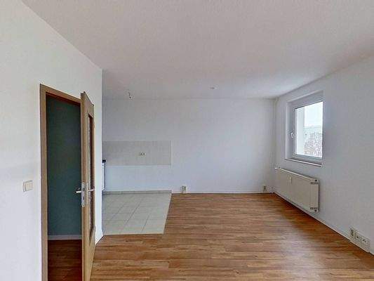 Ansicht III: Wohn- und Esszimmer mit offenem Küchenbereich