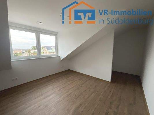 Schlafzimmer mit begehbarem Kleiderschrank